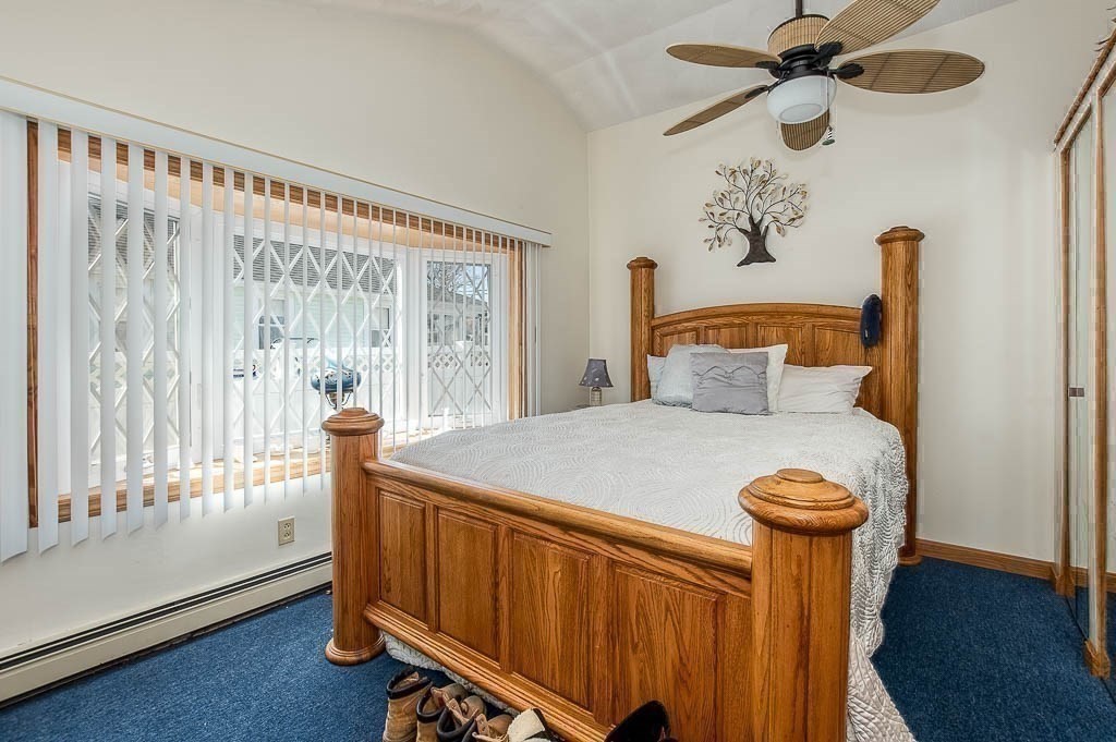 26 Washington Drive Wareham, MA 02571 - Photo 13 of 42 a bedroom with a bed and a window