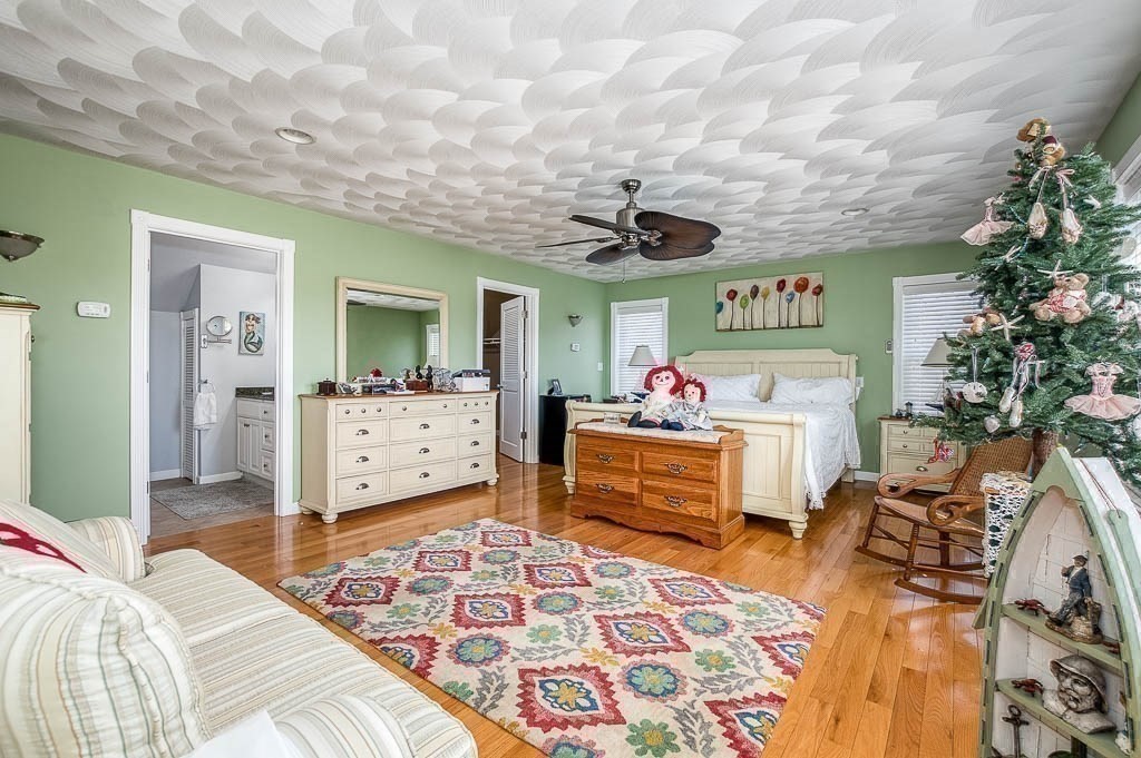 26 Washington Drive Wareham, MA 02571 - Photo 18 of 42 a bedroom with furniture and a rug
