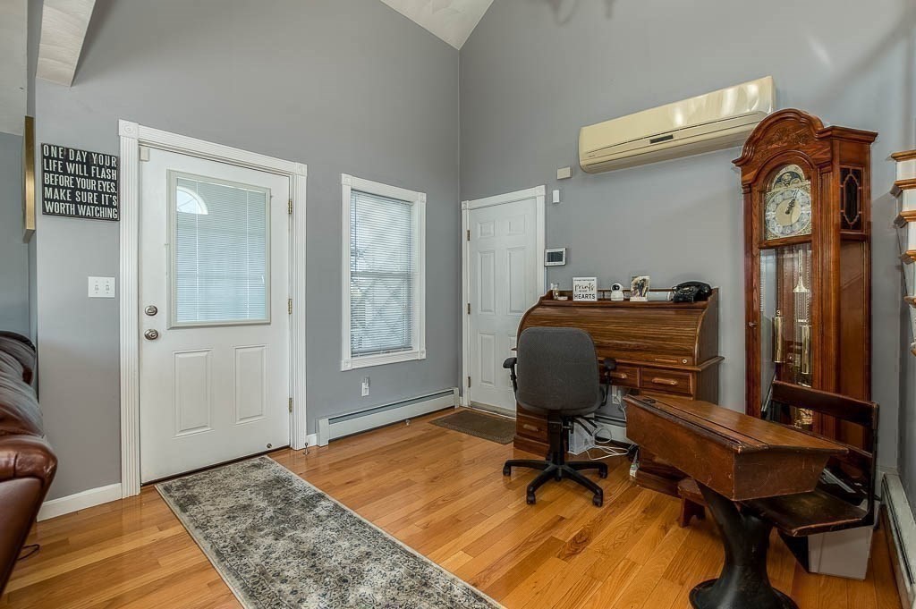26 Washington Drive Wareham, MA 02571 - Photo 3 of 42 a view of workspace with lounge chair