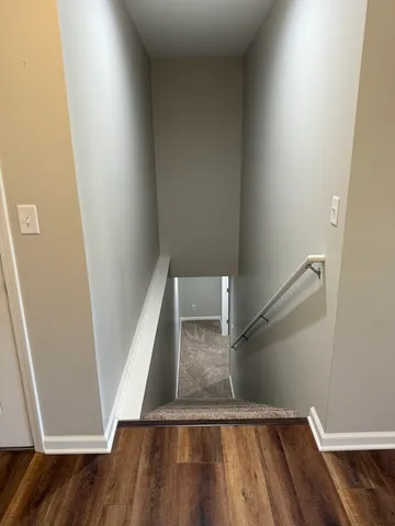 a view of entryway with wooden floor