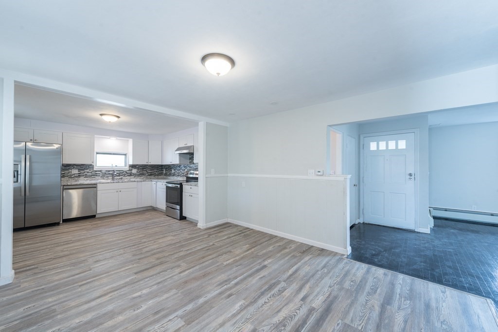 84 Lamont Street Springfield, MA 01119 - Photo 4 of 21 a view of kitchen view wooden floor and electronic appliances