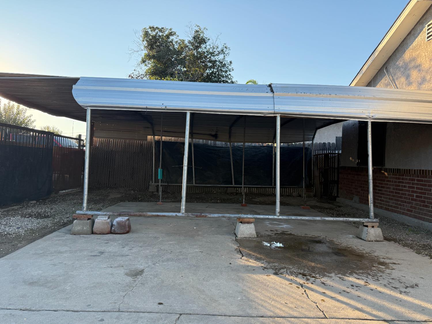 1401 Inyo Avenue Modesto, CA 95358 - Photo 13 of 16 a view of a house with a door and a window