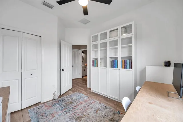 a bedroom with a bed and a view of bathroom