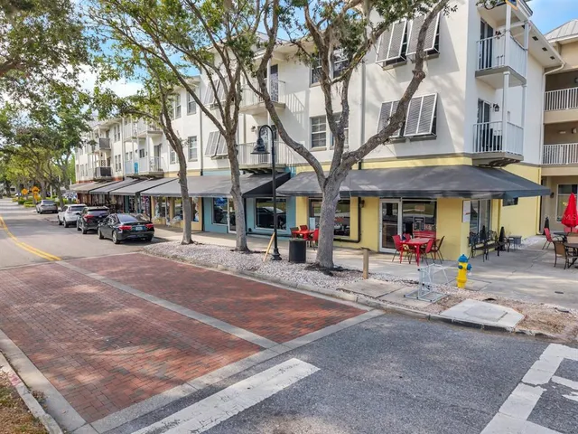 a view of a street with cars
