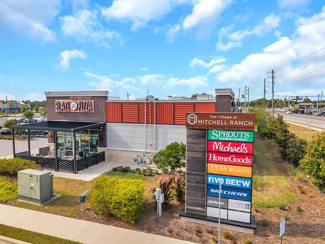 a view of a backyard with a garden