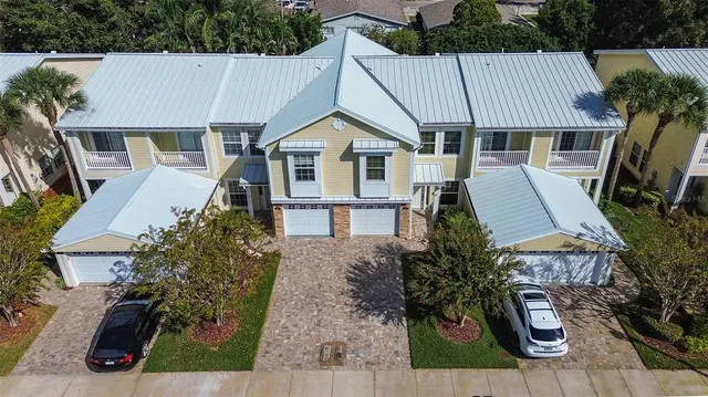 a aerial view of a house with garden and plants