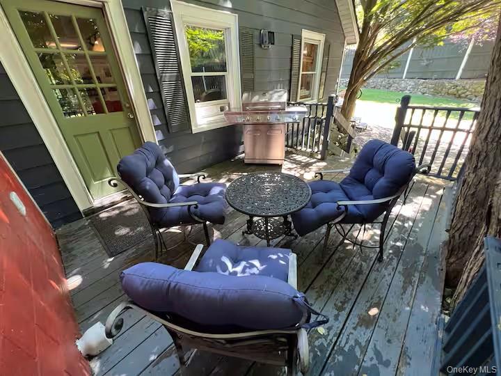 149 Jaycox Road Cold Spring, NY 10516 - Photo 18 of 19 Wooden deck with a grill and outdoor lounge area