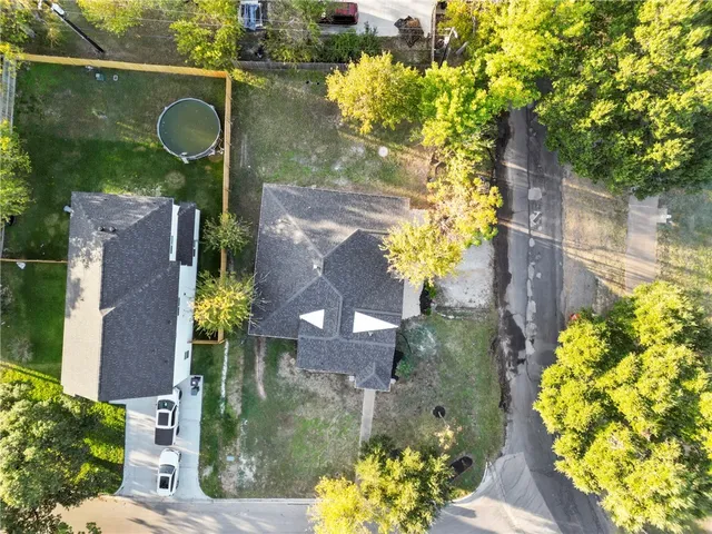a view of an house with backyard space and garden