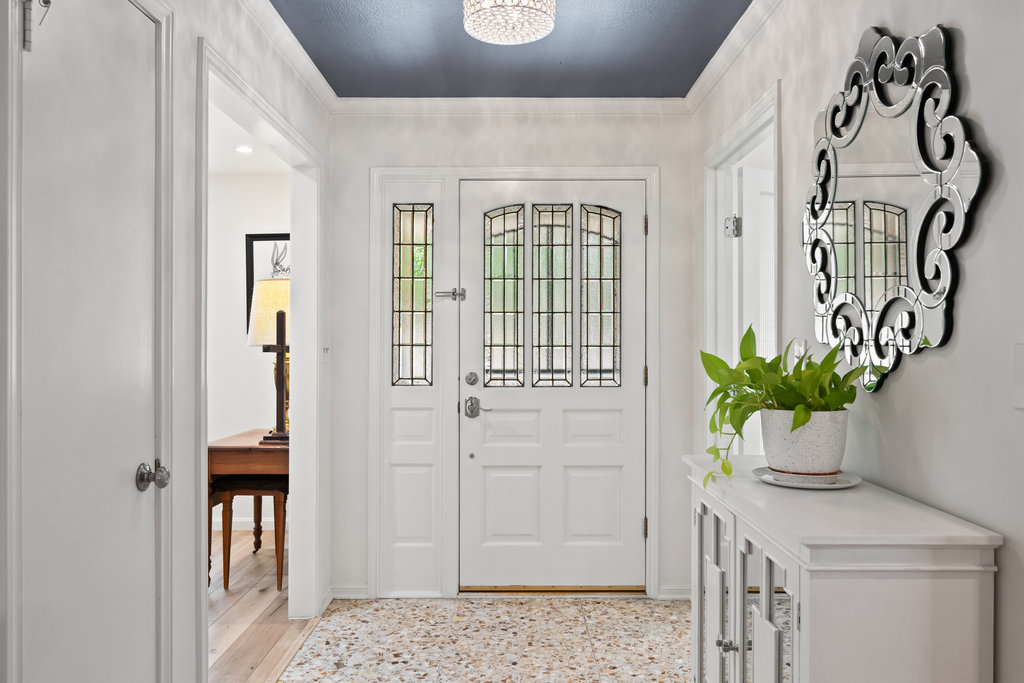 1709 Crested Butte Drive Austin, TX 78746 - Photo 4 of 40 a view of entryway with wooden floor