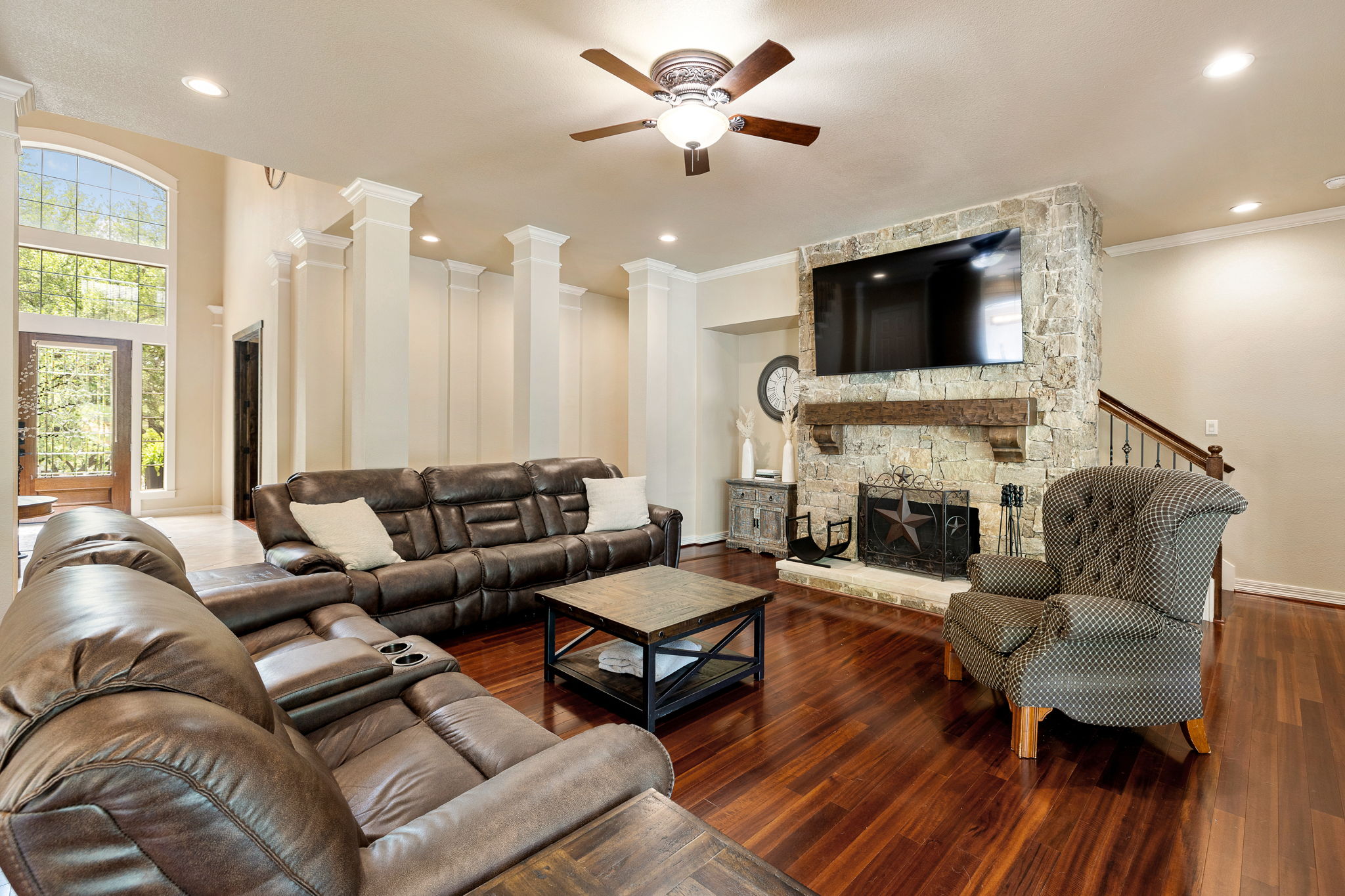 3609 Goodnight Trail Leander, TX 78641 - Photo 14 of 39 a living room with furniture fireplace and a flat screen tv