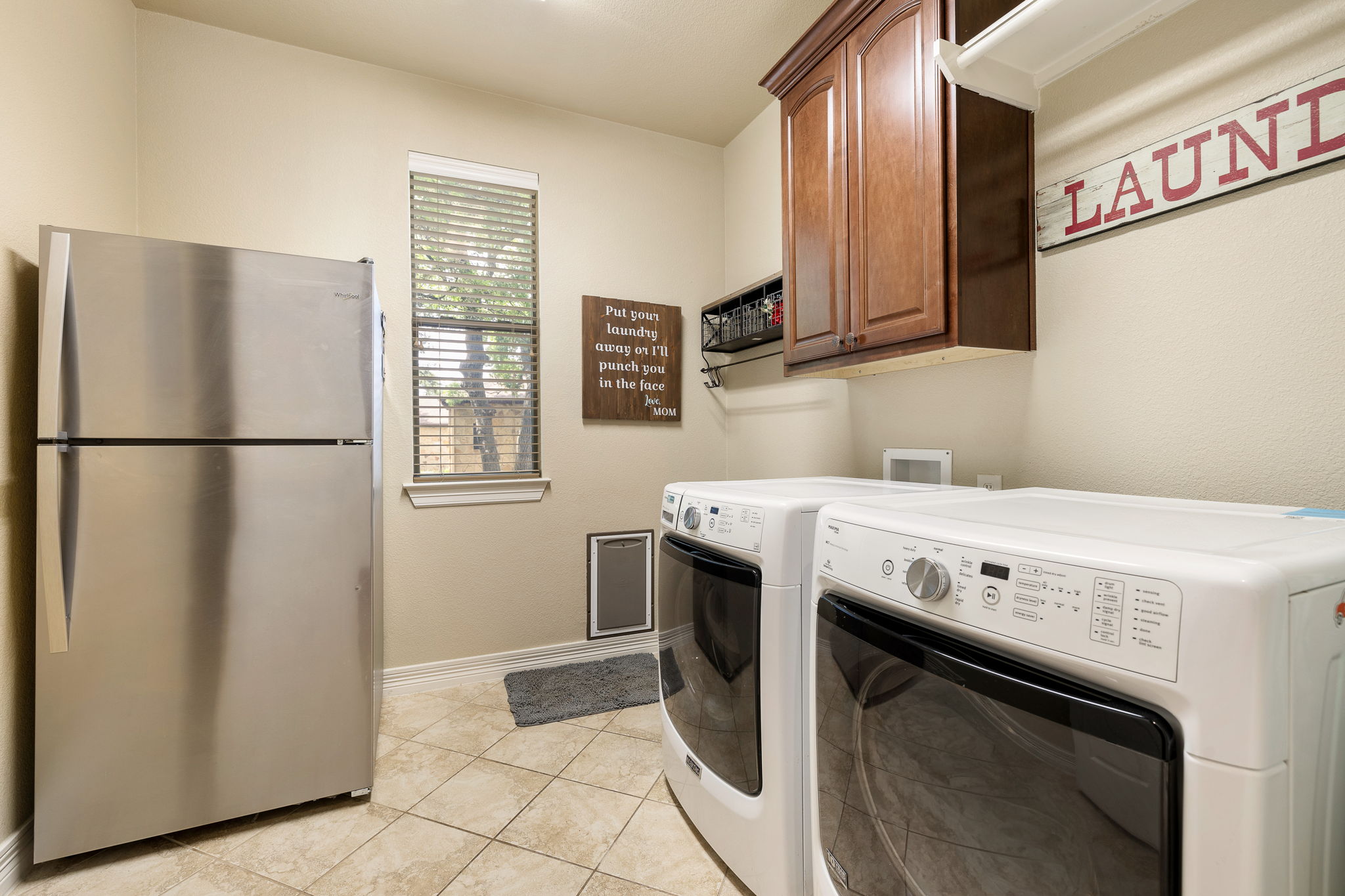 3609 Goodnight Trail Leander, TX 78641 - Photo 21 of 39 a view of kitchen with washer and dryer