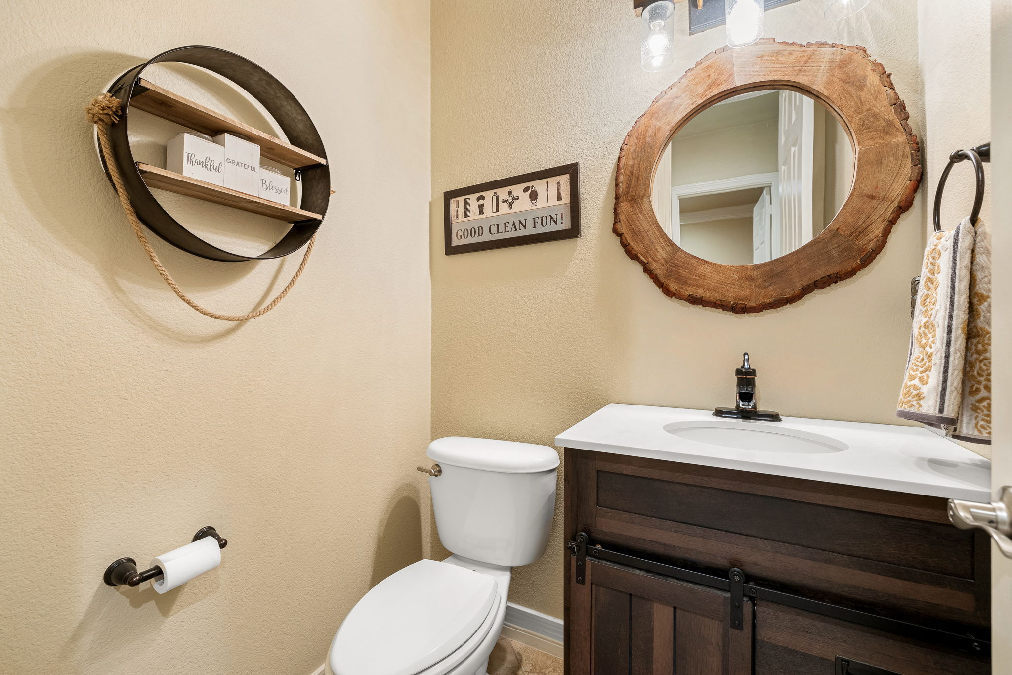 3609 Goodnight Trail Leander, TX 78641 - Photo 22 of 39 a bathroom with a sink a mirror and a toilet