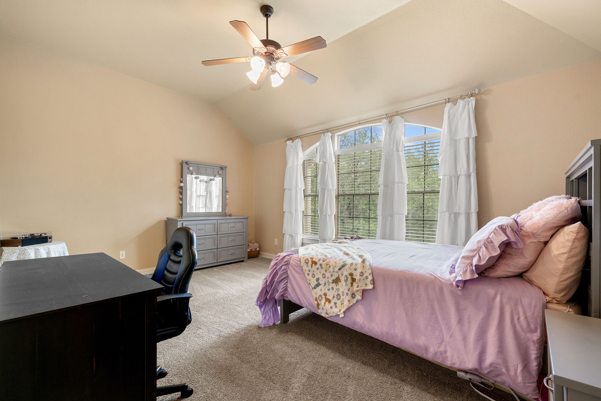 3609 Goodnight Trail Leander, TX 78641 - Photo 30 of 39 a bedroom with a bed window and a couch