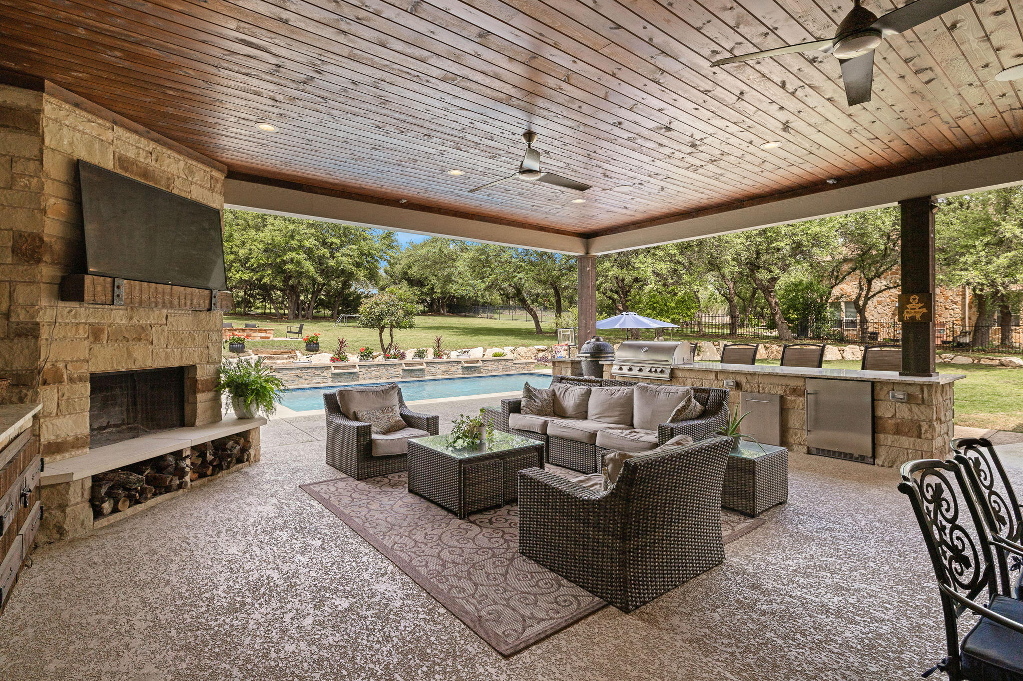 3609 Goodnight Trail Leander, TX 78641 - Photo 33 of 39 a living room with fireplace furniture and a flat screen tv