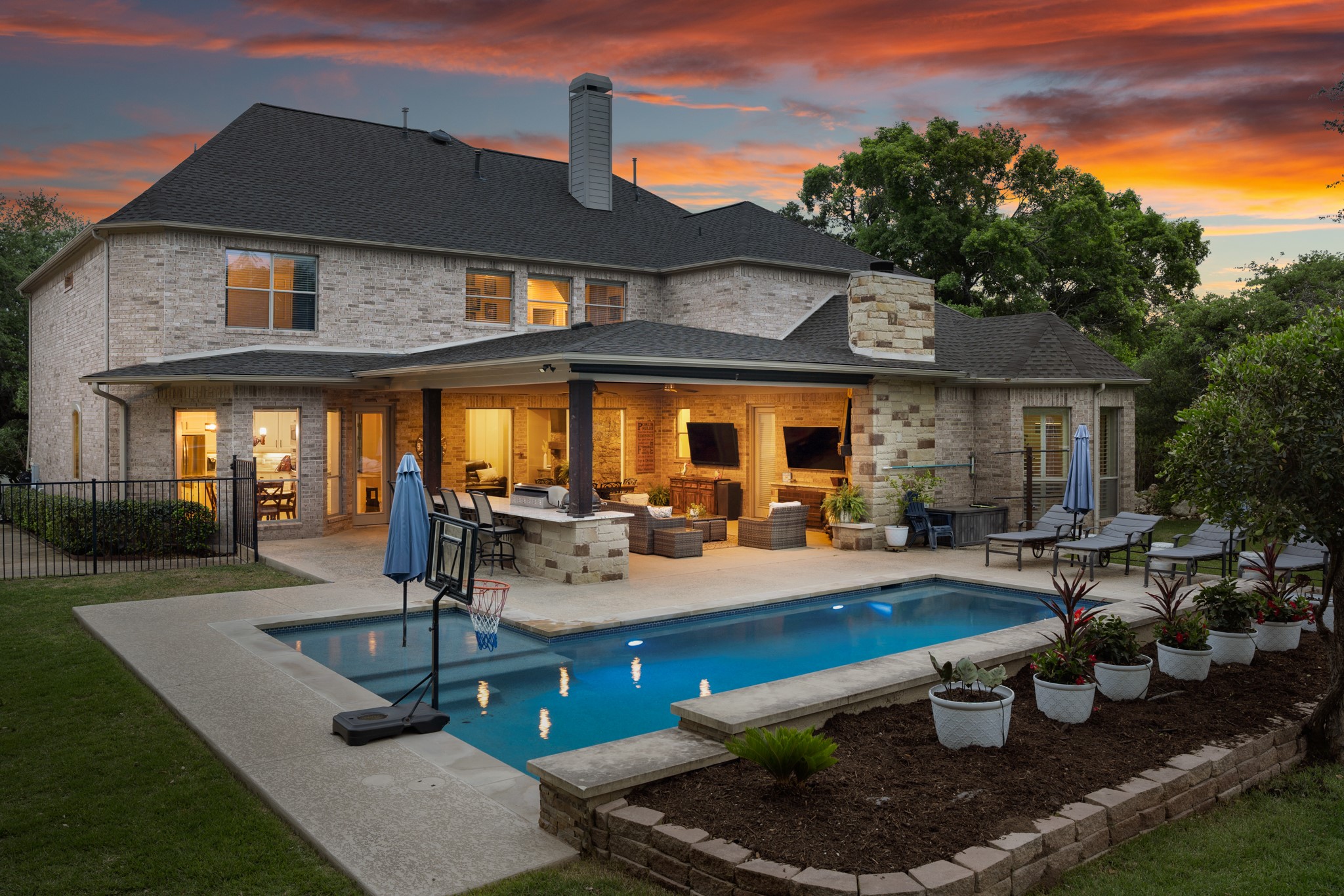 3609 Goodnight Trail Leander, TX 78641 - Photo 36 of 39 a view of a house with backyard sitting area and garden