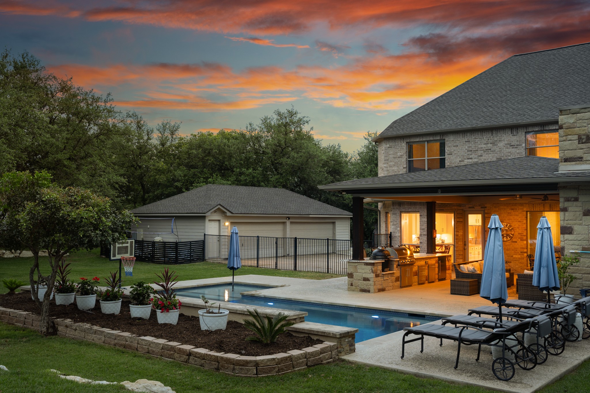 3609 Goodnight Trail Leander, TX 78641 - Photo 5 of 39 a front view of a house with swimming pool garden and patio