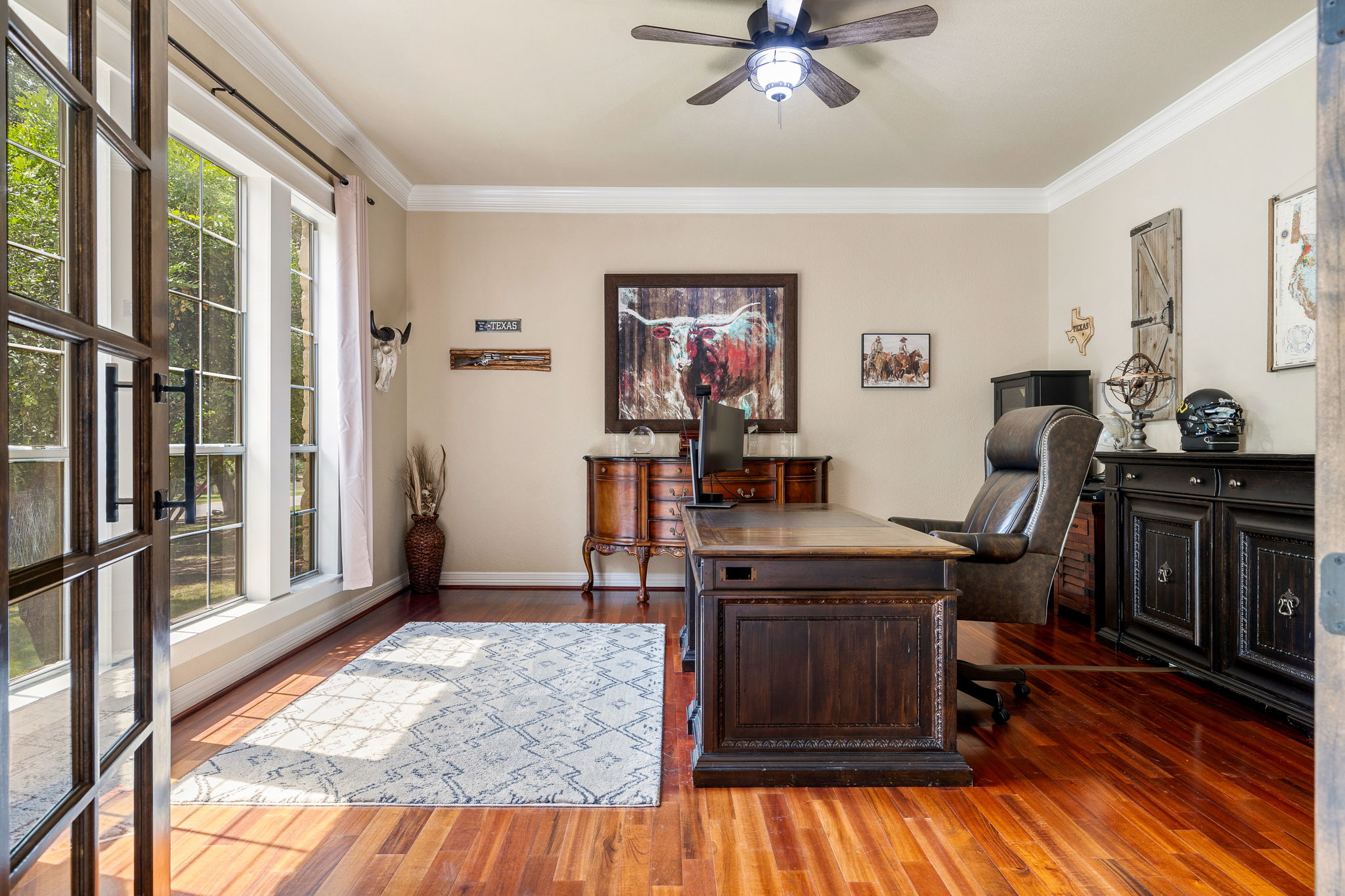 3609 Goodnight Trail Leander, TX 78641 - Photo 7 of 39 a view of a workspace with furniture and a window