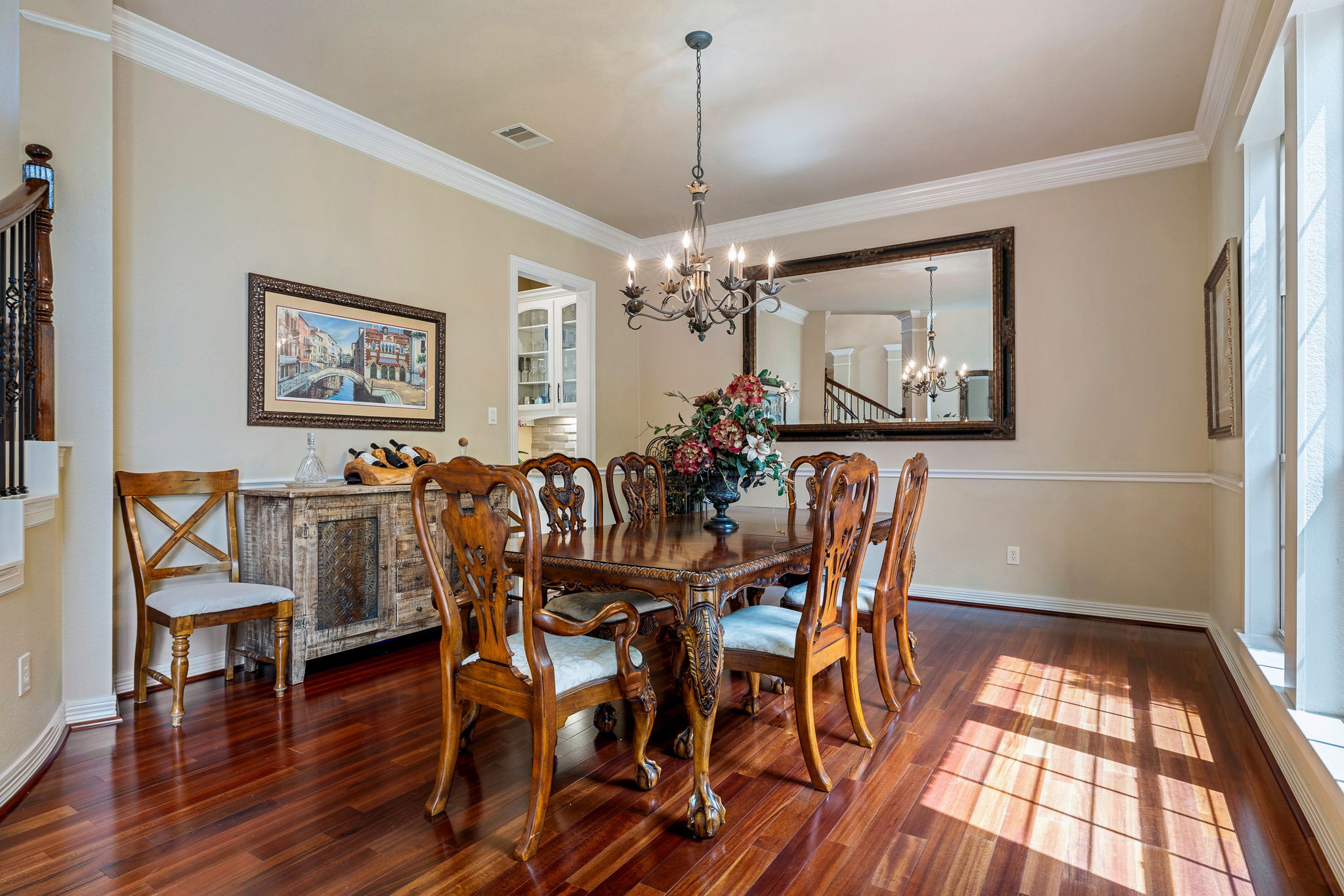 3609 Goodnight Trail Leander, TX 78641 - Photo 8 of 39 a view of a dining room with furniture wooden floor and chandelier