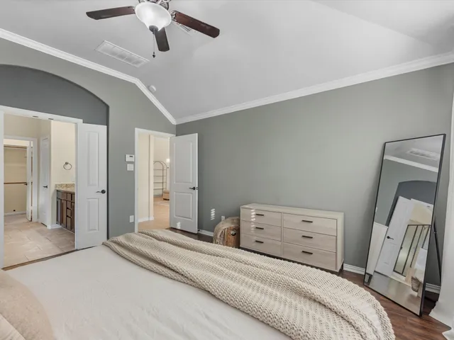 a bathroom with a granite countertop sink double and mirror