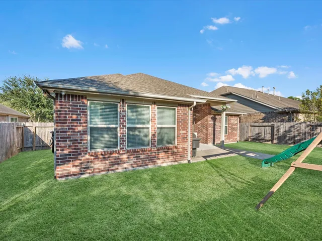 a view of a garden with a slide