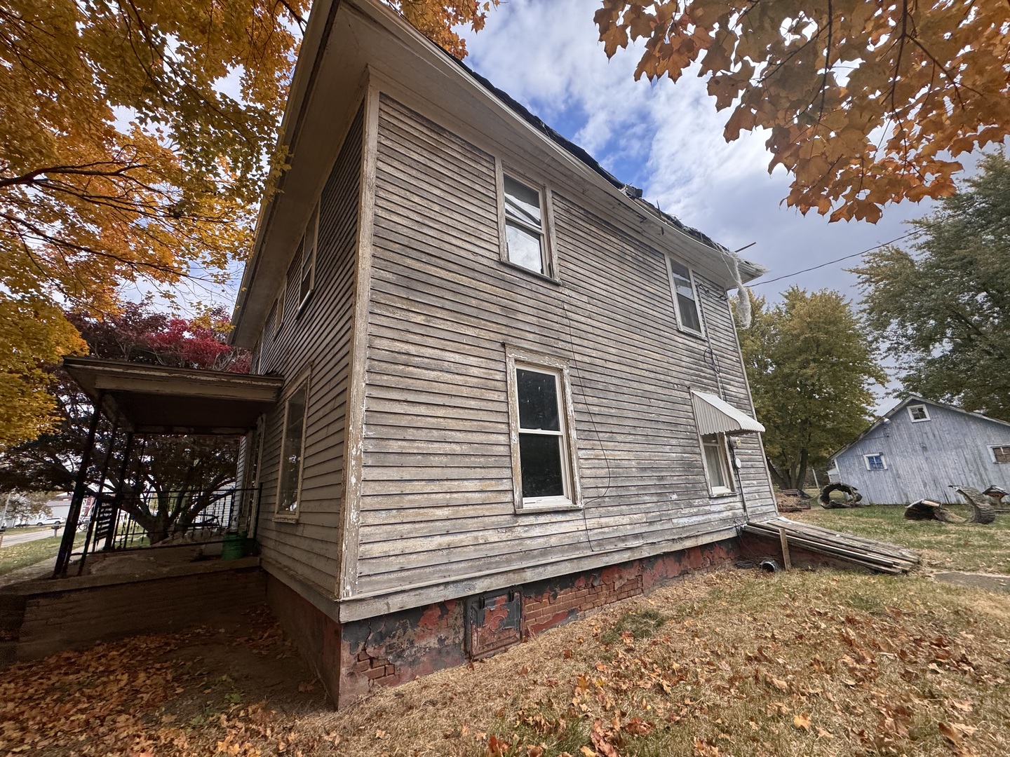 309 West Commercial Street Neponset, IL 61345 - Photo 2 of 9 a view of a house with a yard