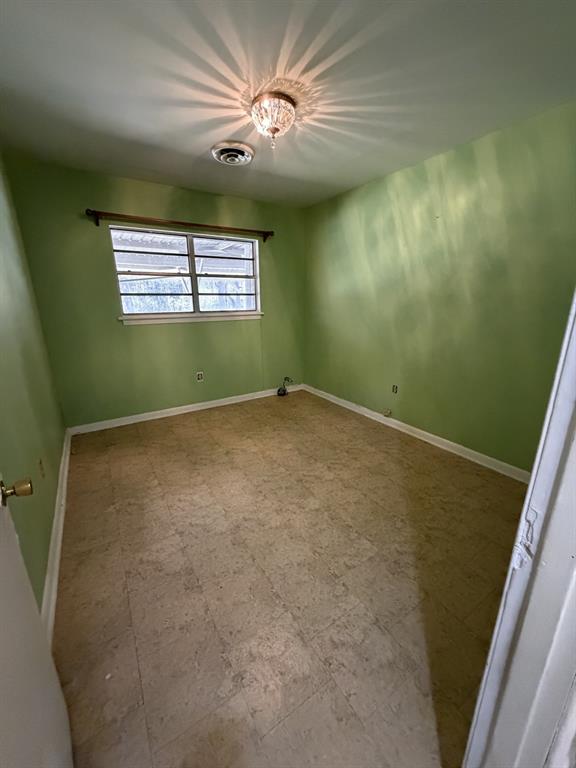 134 Hope Street Mansfield, LA 71052 - Photo 15 of 23 Bedroom 1 featuring tile patterned floors