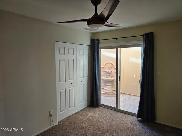 a view of empty room with windows