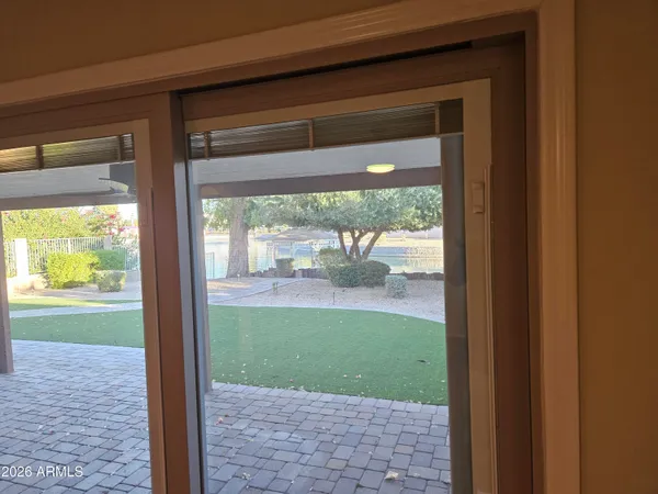 a view of porch with a yard