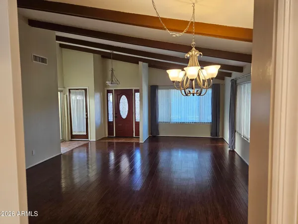 a view of gallery with wooden floor