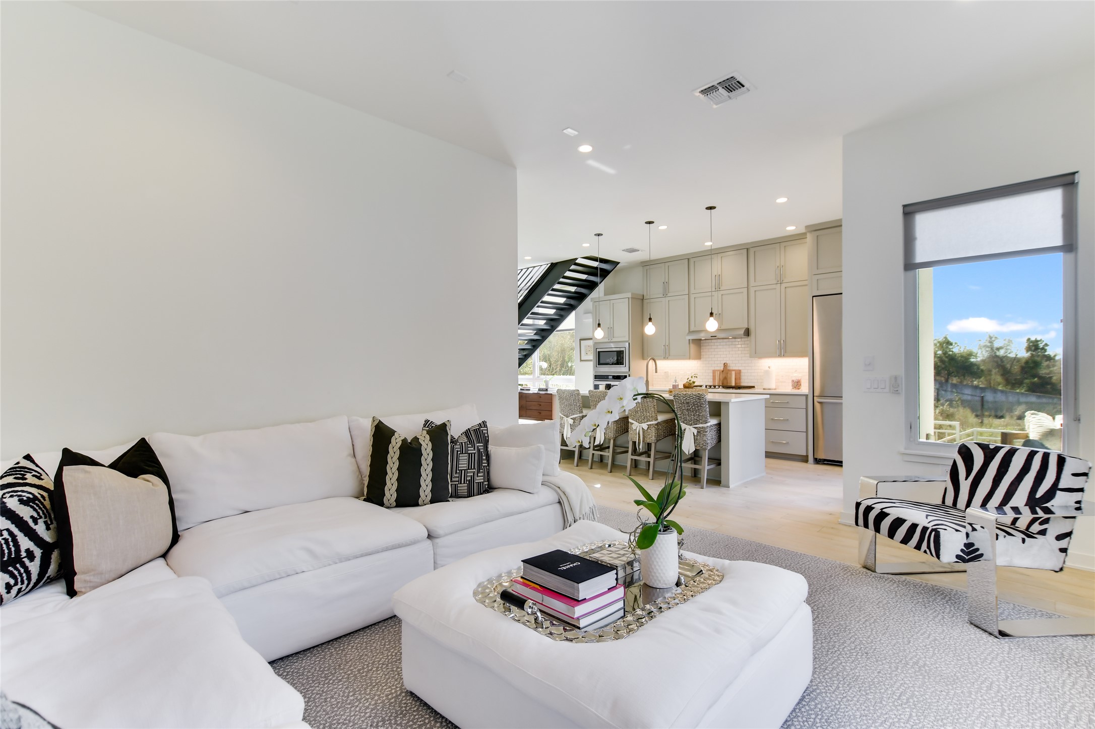 2606 Sutherland Street Austin, TX 78746 - Photo 12 of 22 The large windows bring the outside in