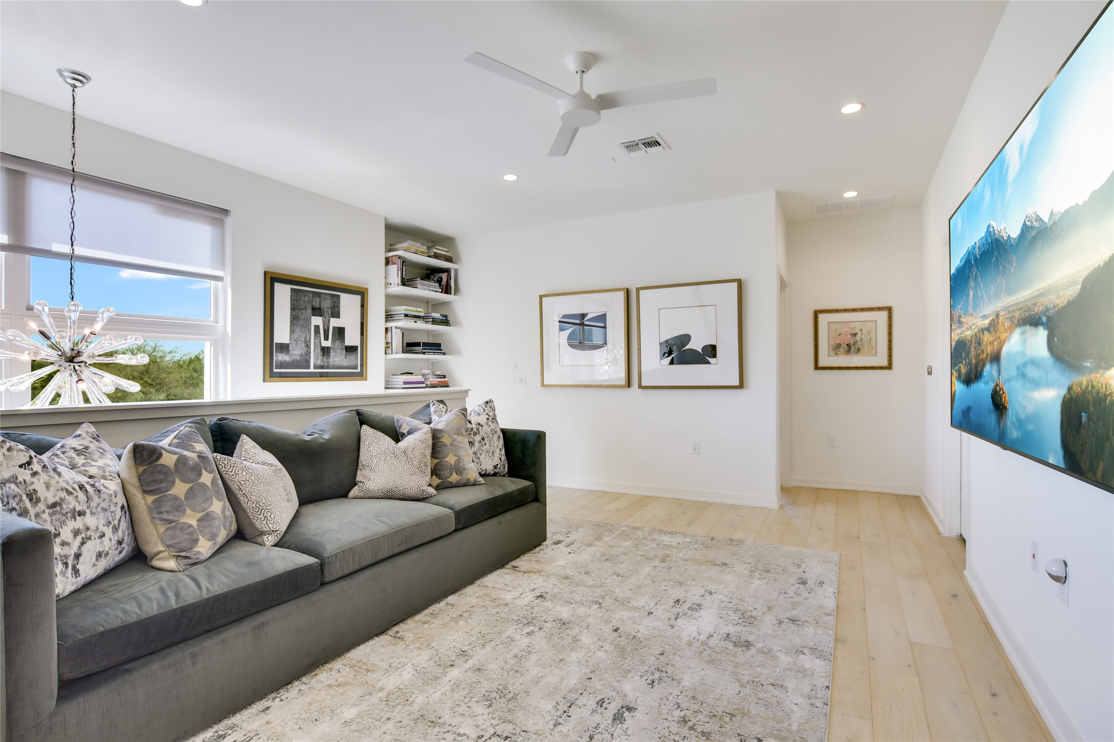 2606 Sutherland Street Austin, TX 78746 - Photo 13 of 22 The second living area, at the top of the stairs, is perfect for kids, media room or office space