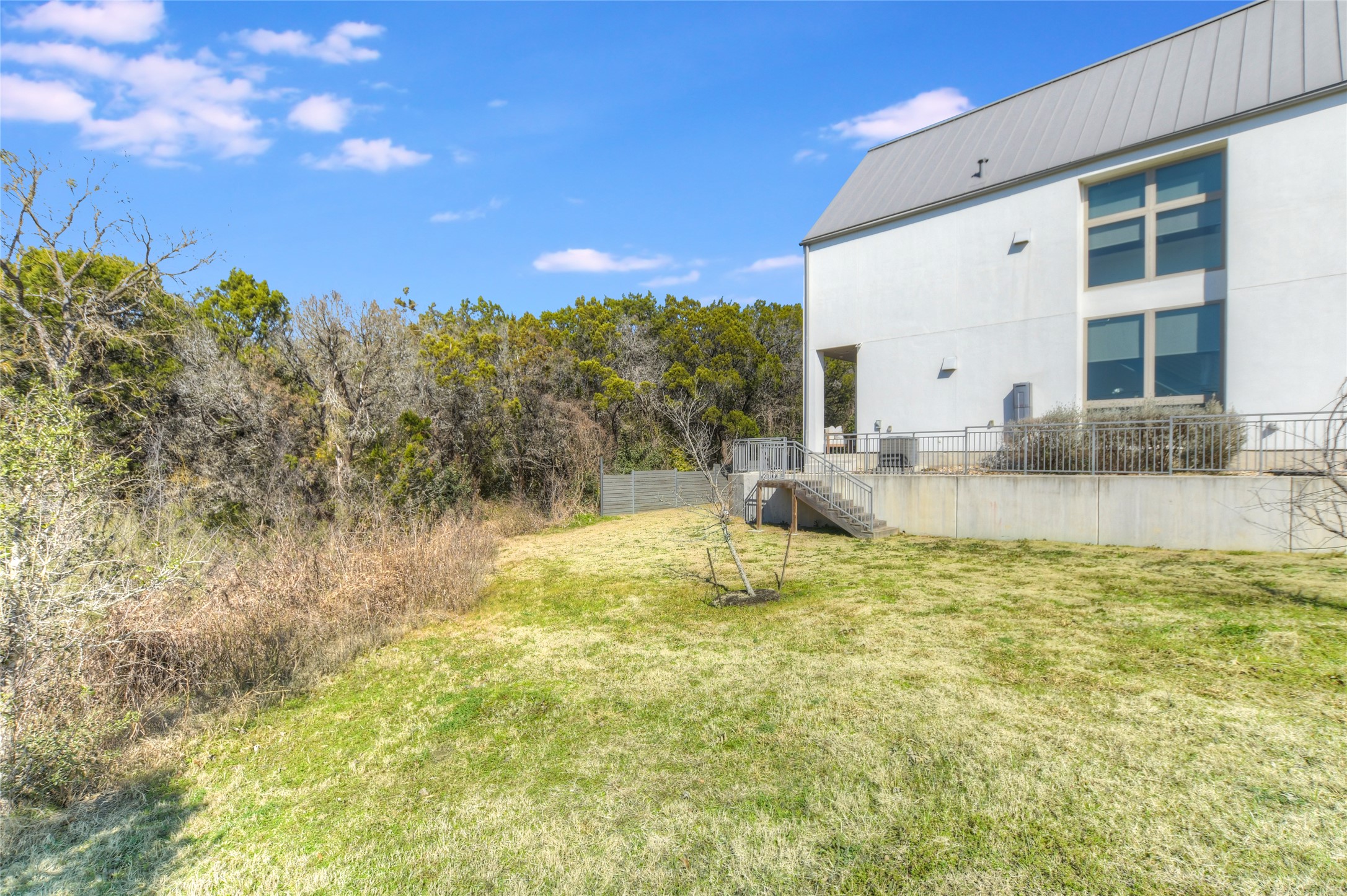 2606 Sutherland Street Austin, TX 78746 - Photo 21 of 22 Privacy is paramount in this lovely end unit