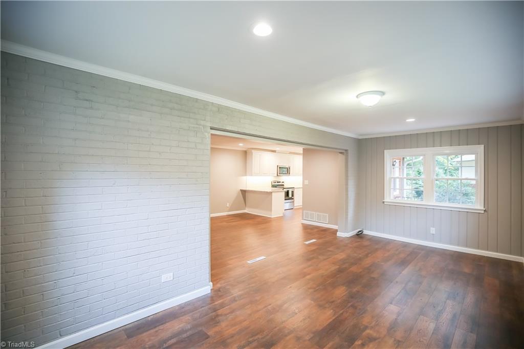 2745 Tudor Road Winston-Salem, NC 27106 - Photo 14 of 45 2745 Tudor Rd Winston Salem NC 27106 Sunroom into Den
