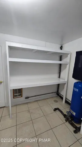 a view of storage and utility room