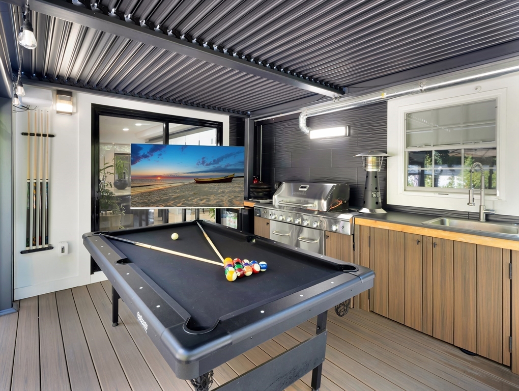 15 Appleton Street Saugus, MA 01906 - Photo 11 of 41 a room with furniture pool table gym equipment wooden floor and window