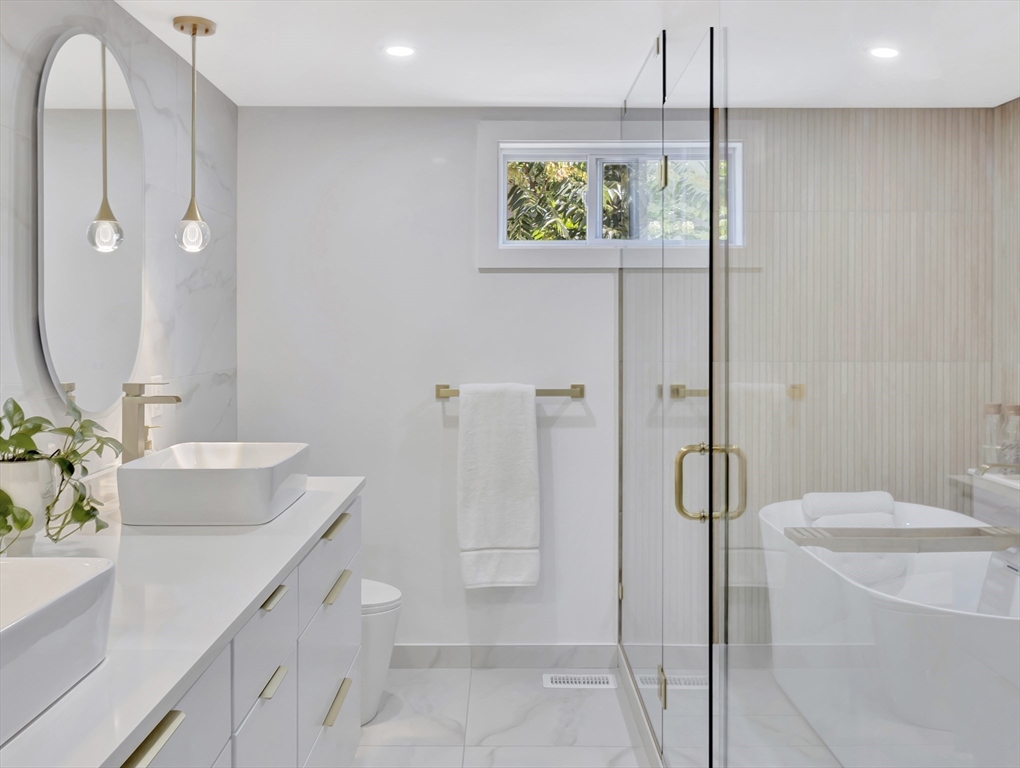 15 Appleton Street Saugus, MA 01906 - Photo 29 of 41 a bathroom with a sink a toilet and shower