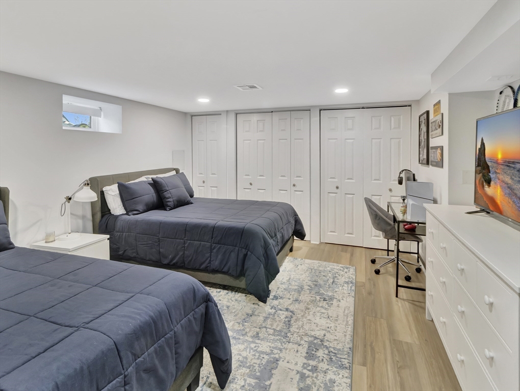 15 Appleton Street Saugus, MA 01906 - Photo 34 of 41 a bedroom with two beds and a flat screen tv