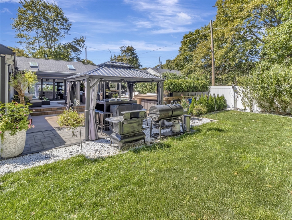 15 Appleton Street Saugus, MA 01906 - Photo 4 of 41 a view of a patio with chairs and potted plants