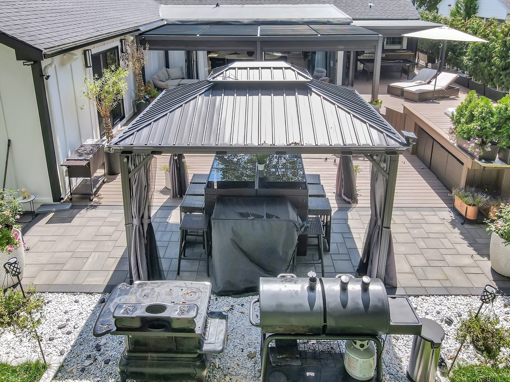 15 Appleton Street Saugus, MA 01906 - Photo 5 of 41 a front view of house with outdoor seating