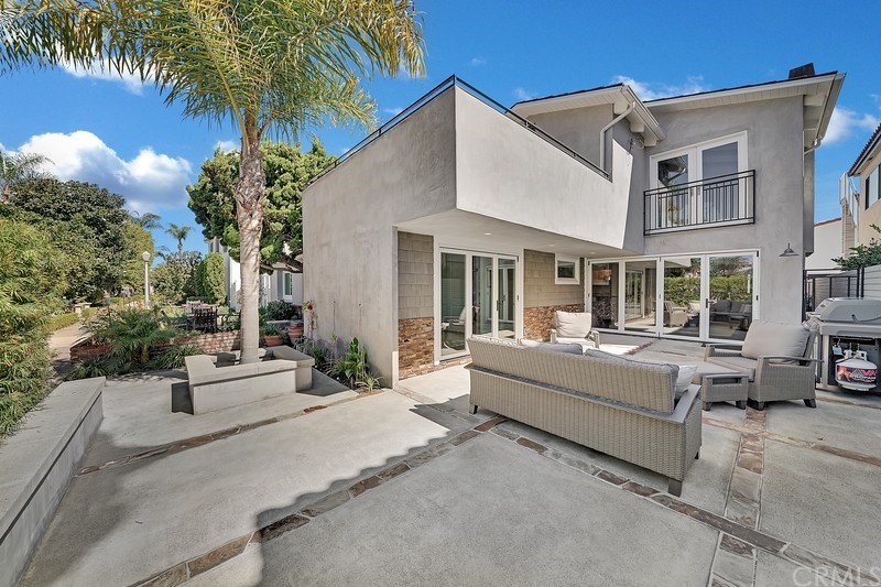 119 Via Nice Newport Beach, CA 92663 - Photo 17 of 30 a view of a white building among the palm trees