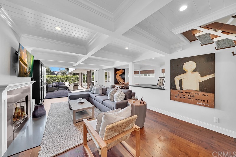 119 Via Nice Newport Beach, CA 92663 - Photo 3 of 30 a living room with fireplace furniture and a flat screen tv