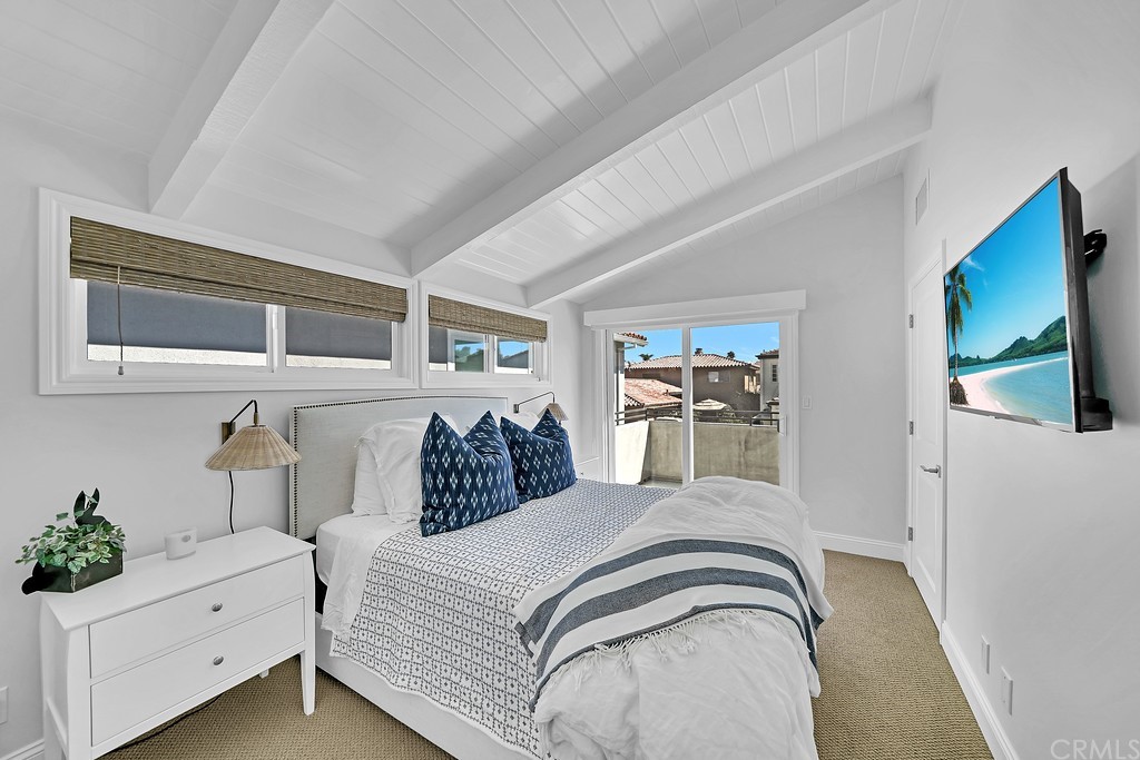 119 Via Nice Newport Beach, CA 92663 - Photo 24 of 30 a bedroom with bed and window