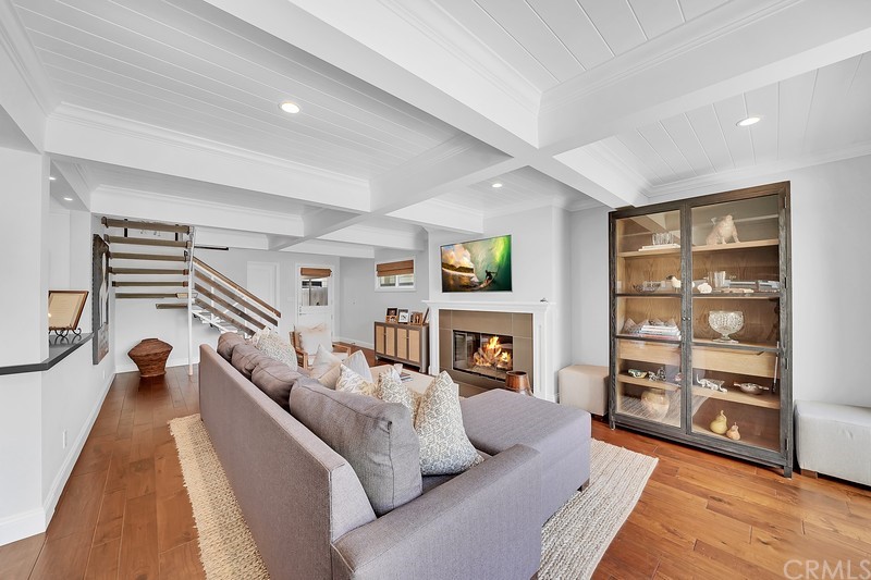 119 Via Nice Newport Beach, CA 92663 - Photo 5 of 30 a living room with furniture and a fireplace