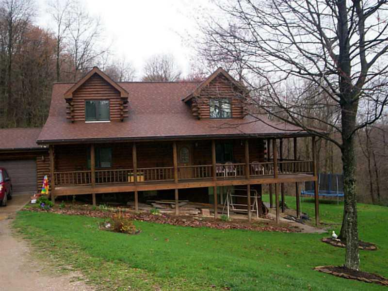 233 Davis Road Aliquippa, PA 15001 - Photo 1 of 14 Exterior Front. Beautiful log home on 31 acres