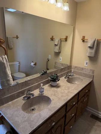 a bathroom with a shower and a tub