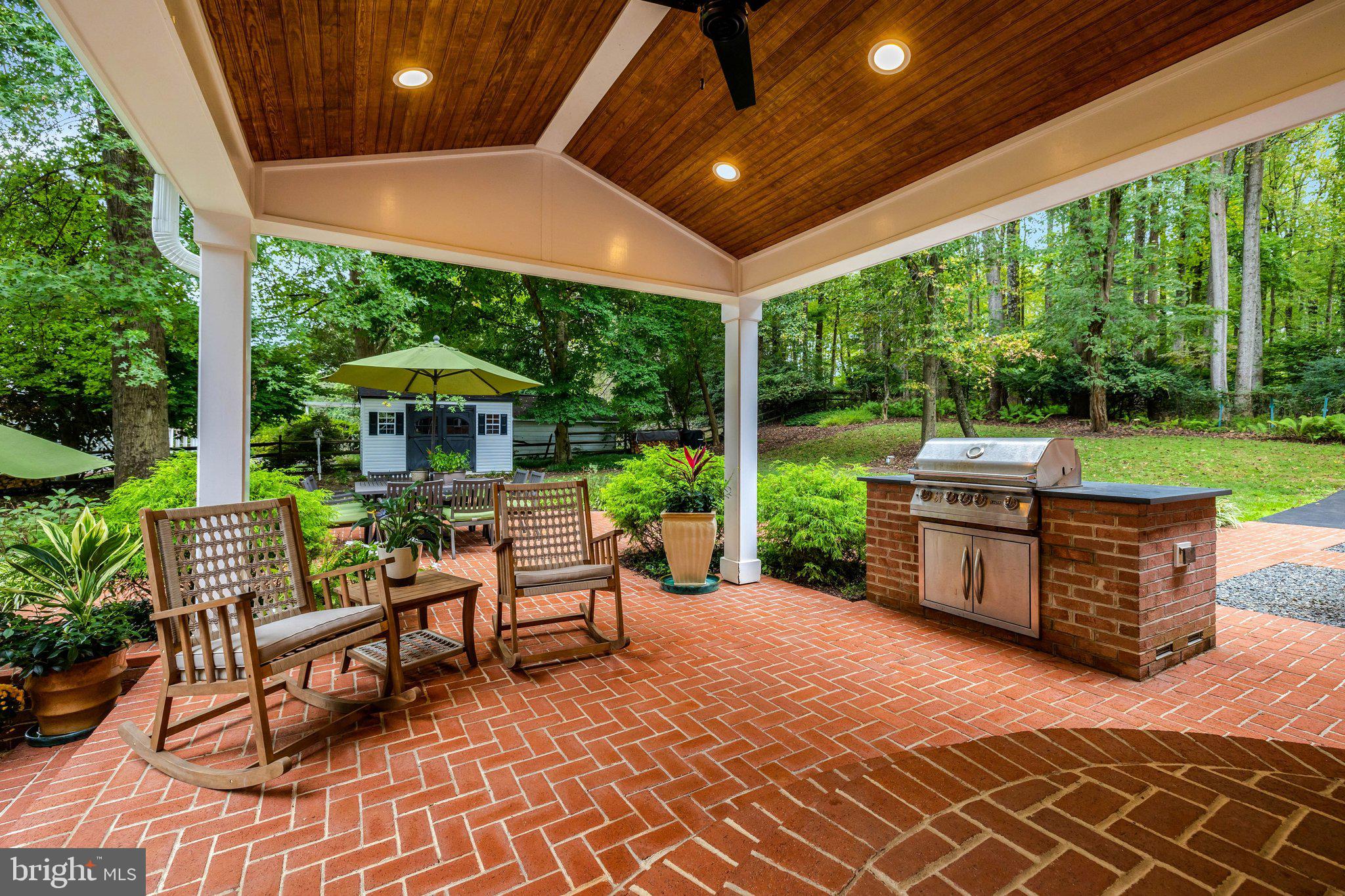 10015 Saddle Road Vienna, VA 22181 - Photo 70 of 95 Main level Patio w/ built-in grill!