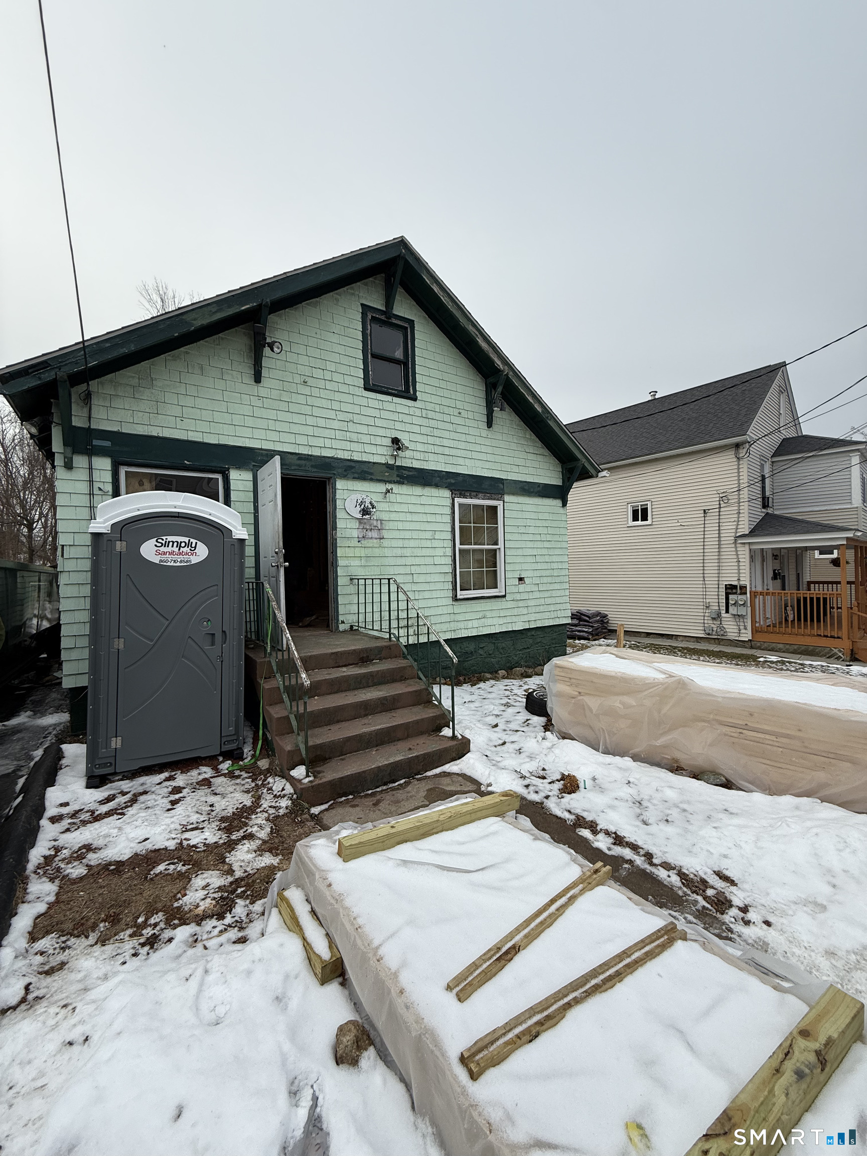 141 Poquonnock Road Groton, CT 06340 - Photo 3 of 19 a front view of a house with yard