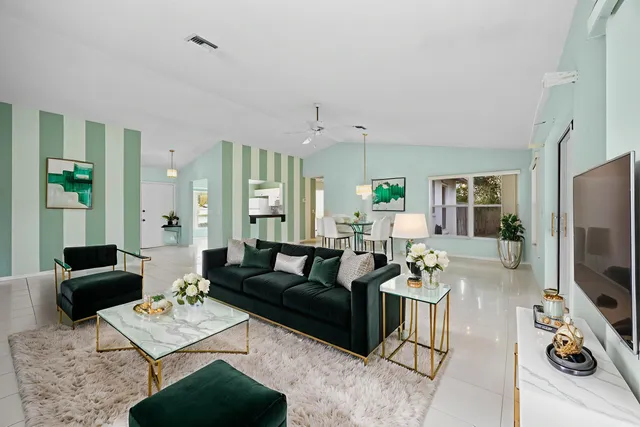 a dining room with furniture and window