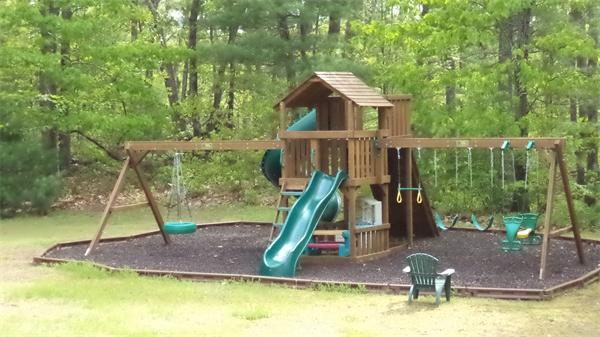 70 Frye Road Bolton, MA 01740 - Photo 4 of 27 a view of a house with a yard