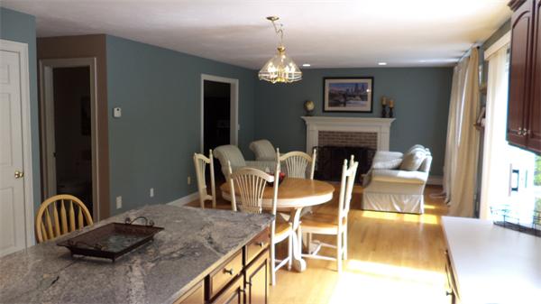 70 Frye Road Bolton, MA 01740 - Photo 5 of 27 a dining room with furniture chandelier and wooden floor